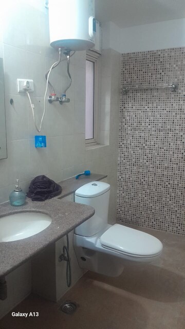 Bathroom in 4 BHK Apartment at Nirvana Country Birch Court, Sector 50 – for Rent
