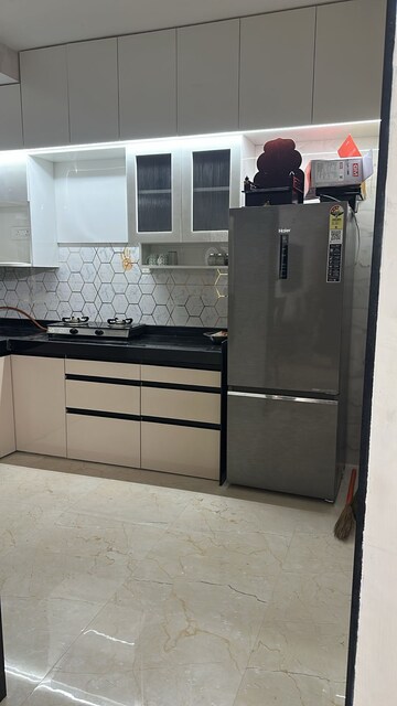 Kitchen in 2 BHK Apartment at Dosti West County, Balkum Pada – for Rent