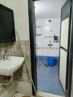 Bathroom in 2 BHK Apartment at Shree Avighna Heights, Dombivli East – for Sale