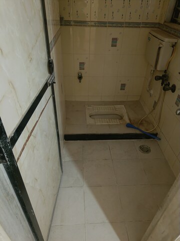 Bathroom in 2 BHK Apartment at Satya Sai Complex, Padma Nagar – for Rent