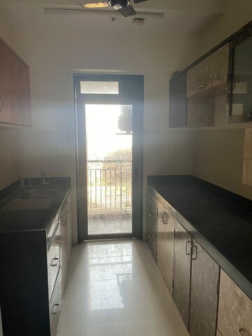Kitchen in 1 BHK Apartment at Puranik City Phase III, Ghodbunder Road – for Rent