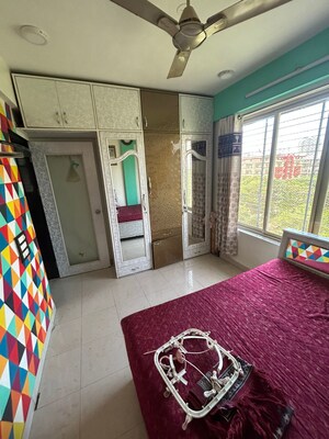 Bedroom in 1 BHK Apartment at Evershine Millenium Paradise, Kandivali East – for Rent