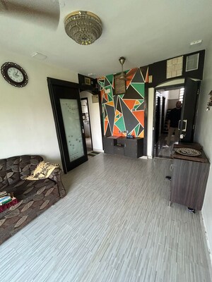 Living Room in 1 BHK Apartment at Evershine Millenium Paradise, Kandivali East – for Rent