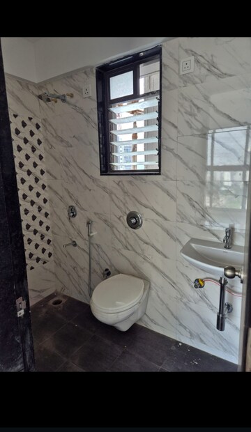 Bathroom in 1 BHK Apartment at UK Iridium, Kandivali East – for Rent