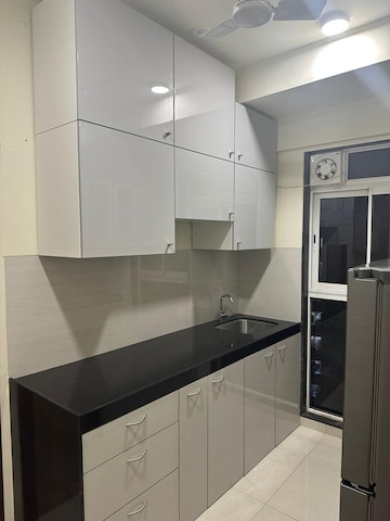 Kitchen in 1 BHK Apartment at Godrej Tranquil, Kandivali East – for Rent