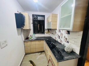 Kitchen in 2 BHK Builder Floor at Rajpur Khurd Extension – for Sale