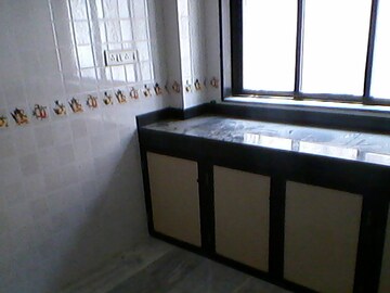 Kitchen in 1 BHK Apartment at Bindra Complex, Andheri East – for Rent