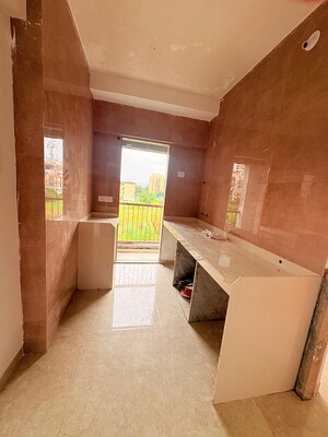 Kitchen in 1 BHK Apartment at Mhatre Vasudev Gardenia, Naigaon East – for Sale