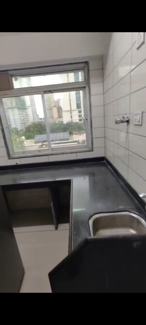 Kitchen in 2 BHK Apartment at Alfa Mana Residence, Mazgaon – for Sale