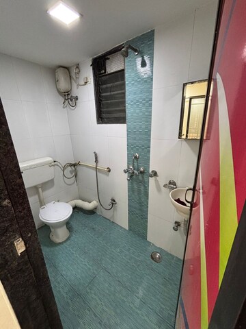 Bathroom in 3 BHK Apartment at Kopar Khairane – for Rent