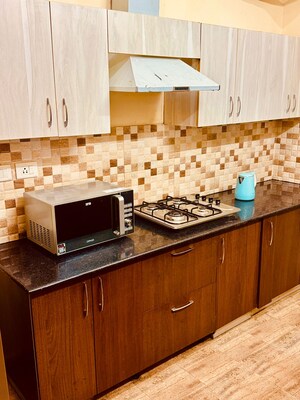 Kitchen in 3 BHK Apartment at Pardos Okas Enclave, Sushant Golf City – for Rent