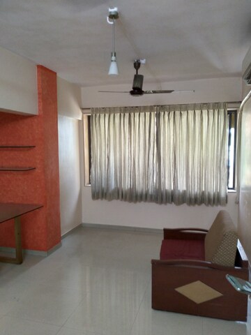 Living Room in 1 BHK Apartment at Adarsh Nagar Society, Worli – for Rent