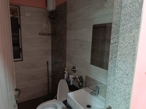 Bathroom in 1 BHK Apartment at Ani Anu Sri Balaji Enclave, Malad West – for Rent