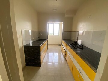 Kitchen in 2 BHK Apartment at Hiranandani Sunrays, Ghodbunder Road – for Rent