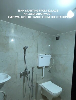 Bathroom in 2 BHK Apartment at Realtech Dhananjay Heights, Nalasopara West – for Sale