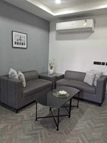 Living Room in 1 BHK Apartment at Dlf Cyber City, Sector 24 – for Rent