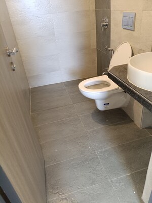 Bathroom in 4 BHK Apartment at Kanchanganga CHS, Goregaon East – for Sale