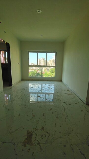 Living Room in 2 BHK Apartment at Elite The Crown, Tilak Nagar – for Sale