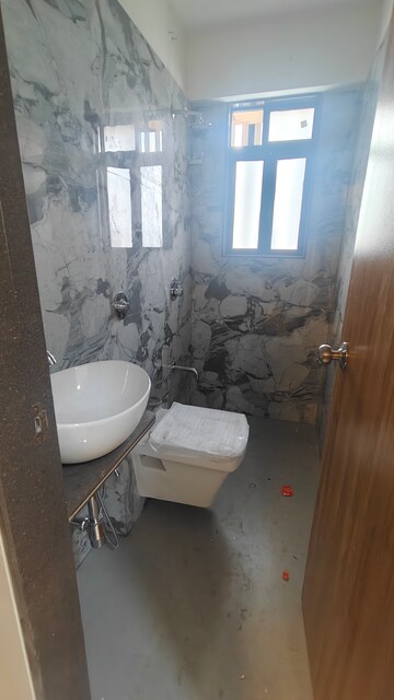 Bathroom in 1 BHK Apartment at Elite The Crown, Tilak Nagar – for Sale
