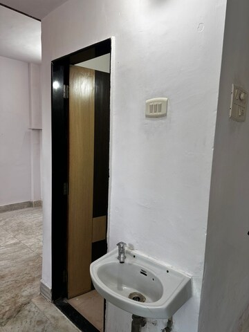 Bathroom in 1 RK Apartment at Mantri Park, Goregaon East – for Rent