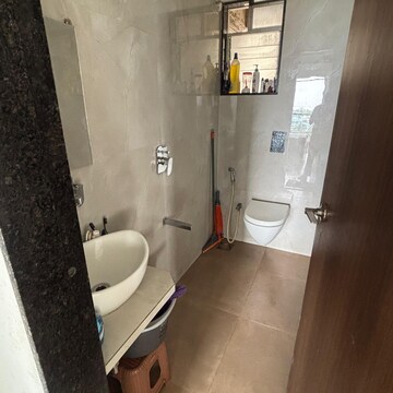 Bathroom in 2 BHK Apartment at Chamunda Serene, Seawoods West – for Sale