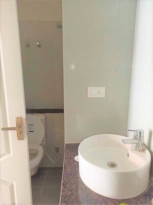 Bathroom in 3 BHK Apartment at Sushma Valencia, International Airport Road – for Sale