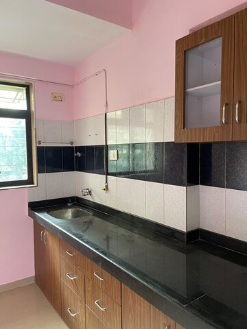 Kitchen in 2 BHK Apartment at Shakya Vihar CHS, Mulund East – for Sale
