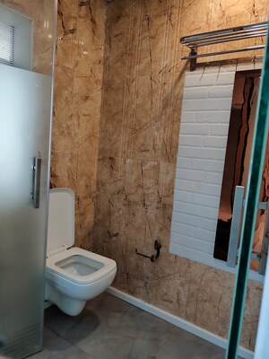 Bathroom in 4 BHK Apartment at Duplex Heights, Andheri West – for Rent