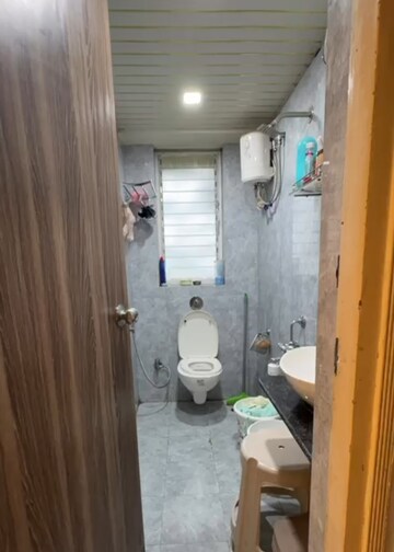 Bathroom in 2 BHK Apartment at Bharat Ecovistas, Shilphata – for Sale