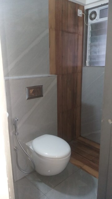 Bathroom in 2 BHK Apartment at Suvasya Swastik Onyx, Tagore Nagar – for Rent