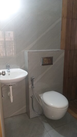 Bathroom in 2 BHK Apartment at Suvasya Swastik Onyx, Tagore Nagar – for Rent