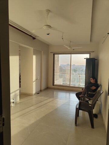 Living Room in 2 BHK Apartment at Wellwisher Kiarah Terrazo, Hadapsar – for Rent