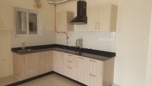 Kitchen in 1 BHK Apartment at Adarsh Greens, Kogilu – for Rent