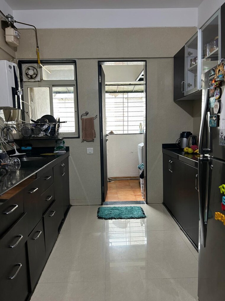 Kitchen, gini-viviana 2 Bedroom 855 Sq.Ft. Apartment In Balewadi Pune 9287783