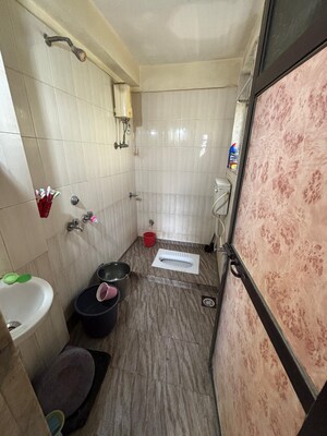Bathroom in 1 BHK Apartment at Dedhia Harshgiri, Dahisar East – for Rent