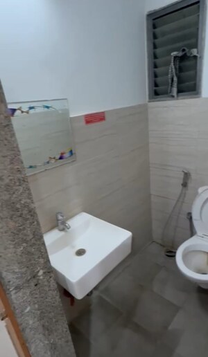 Bathroom in  Office Space at Goyal Titanium Business Park, Makarba – for Rent
