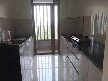 Kitchen in 2 BHK Apartment at Kalpataru Paramount, Kapur Bawdi – for Rent