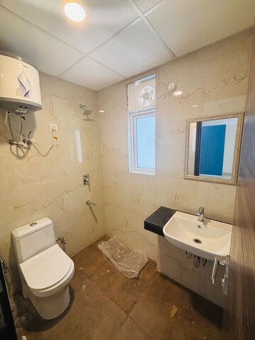Bathroom in 3 BHK Apartment at Smart World Gems, Sector 89 – for Rent