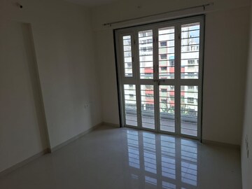 Room in 2 BHK Apartment at Basil Mondale, Mundhwa – for Rent