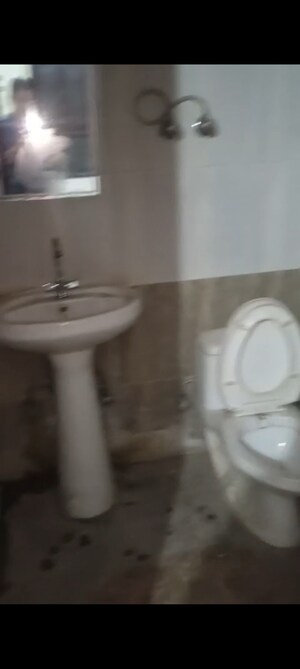 Attached Bathroom in 2 BHK Apartment at Sangwan Heights, Raj Nagar Extension – for Rent