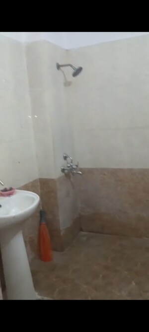 Bathroom in 2 BHK Apartment at Sangwan Heights, Raj Nagar Extension – for Rent