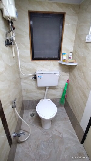 Bathroom in 2 BHK Apartment at Charkop Sector 9 – for Sale