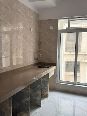 Kitchen in 1 BHK Apartment at Arya Vakratunda CHS, Naupada – for Rent