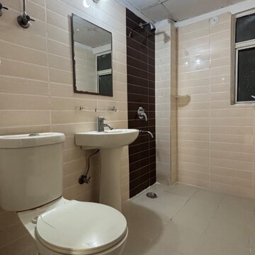 Bathroom in 3 BHK Apartment at Amrapali Zodiac, Sector 120 – for Sale