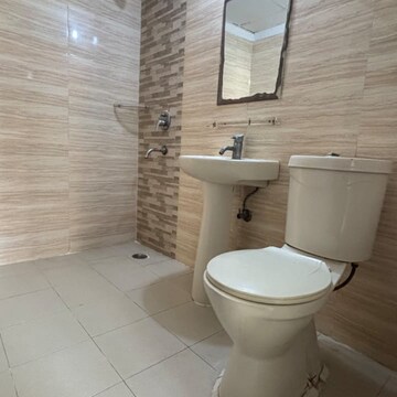 Bathroom in 3 BHK Apartment at Amrapali Zodiac, Sector 120 – for Sale