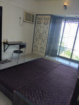 Bedroom in 2 BHK Apartment at Srishti Kailash Tower Apartment, Mulund West – for Rent