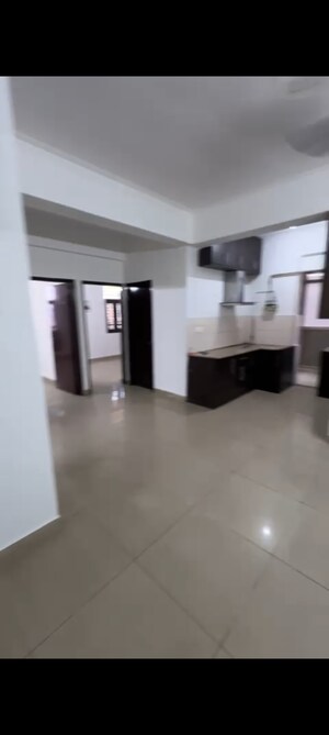 Living Room in 2 BHK Apartment at Gaurs Green Vista, Nyay Khand – for Sale