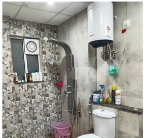 Bathroom in 3 BHK Apartment at Sushma Chandigarh Grande, Lohgarh – for Rent