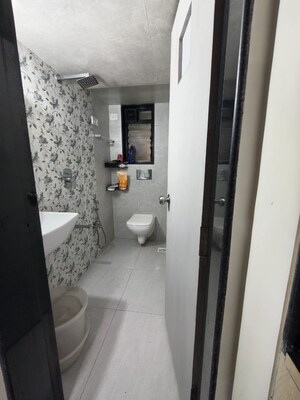 Building Lobby in 2 BHK Apartment at Dheeraj Enclave, Borivali East – for Sale