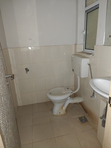 Bathroom in 3 BHK Apartment at DLF New Town Heights II, Sector 86 – for Rent